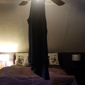 Black glitter sleeveless dress.